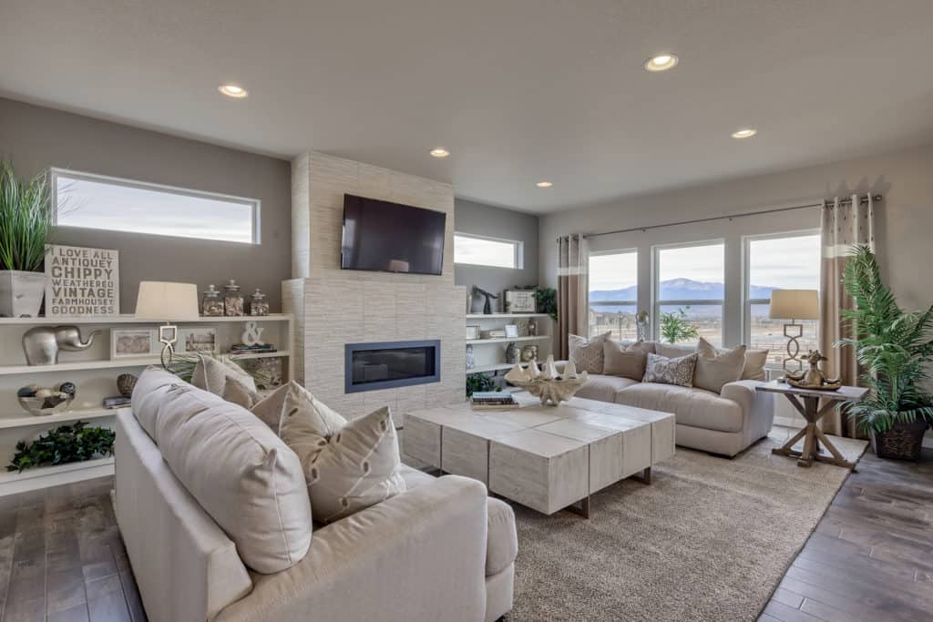 interior design photo of a living room with a full wall fireplace