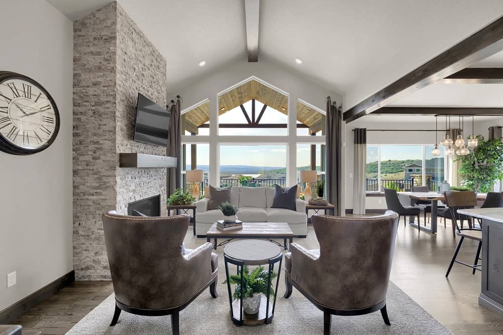 a photo of a living room parade of homes winner with a vaulted ceiling and beams