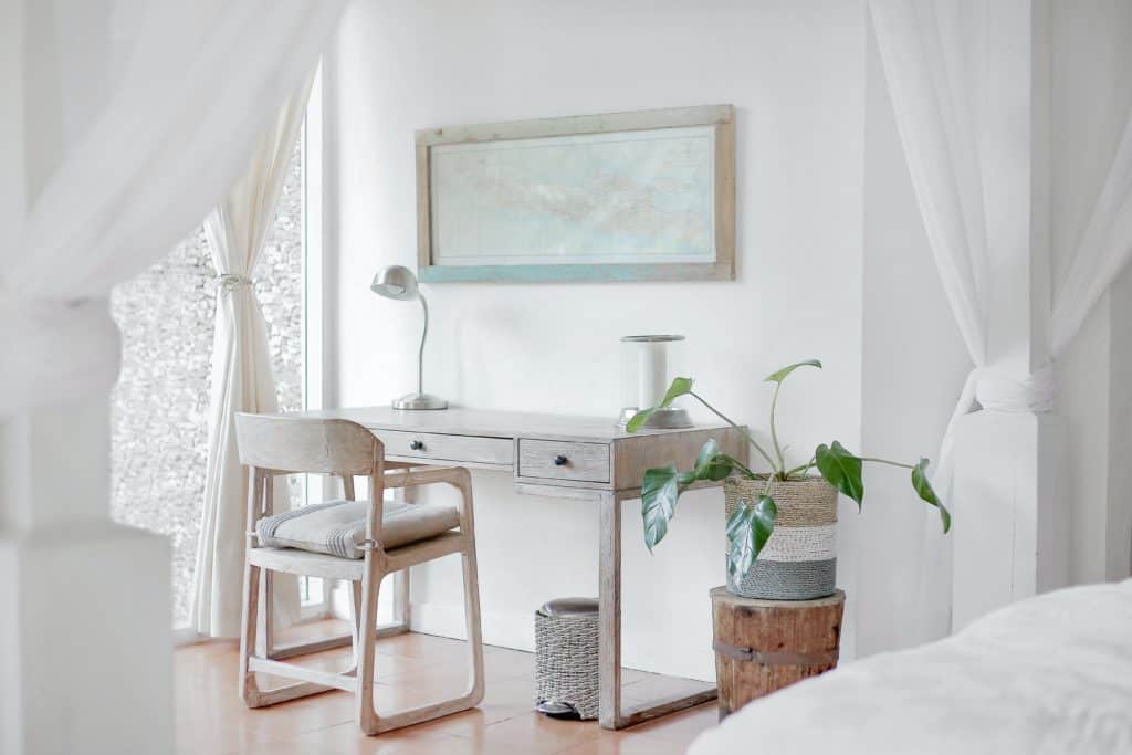 white interior design with grey desk and plants color scheme