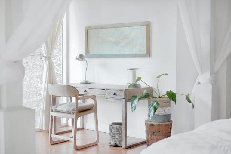 white interior design with grey desk and plants color scheme