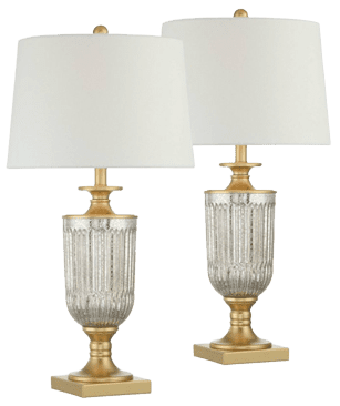 a photo of two brass lamps