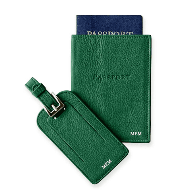 green passport holder and luggage tag