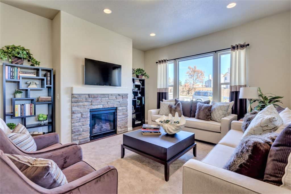 An interior design of a living room in brown and neutral colors