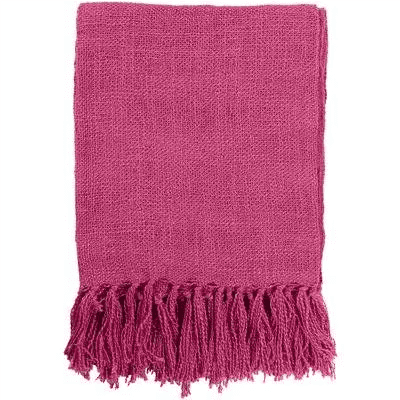 A magenta blanket with fringe